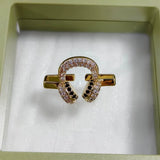 Charm Clip · Earphones, gold