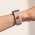 Charm Bar · Red Heart worn on a knit band