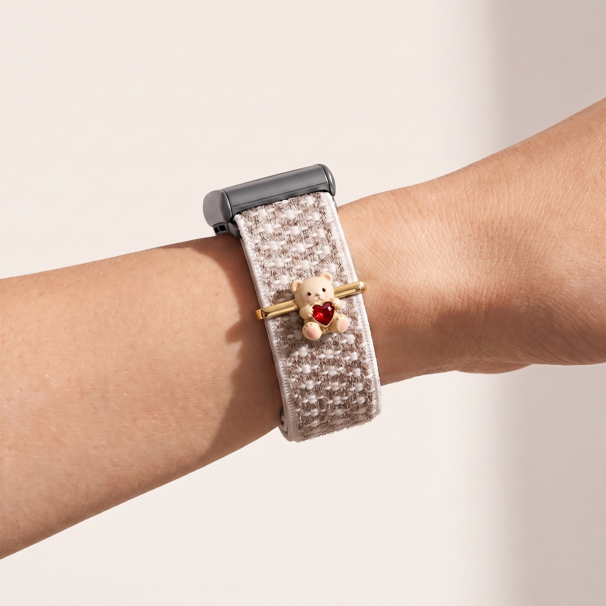 Charm Bar · Teddy worn on a knit band